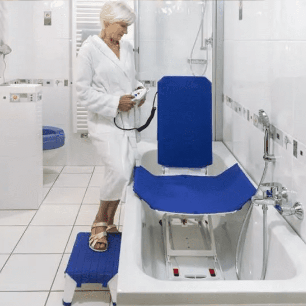 woman in bathroom with bathlift