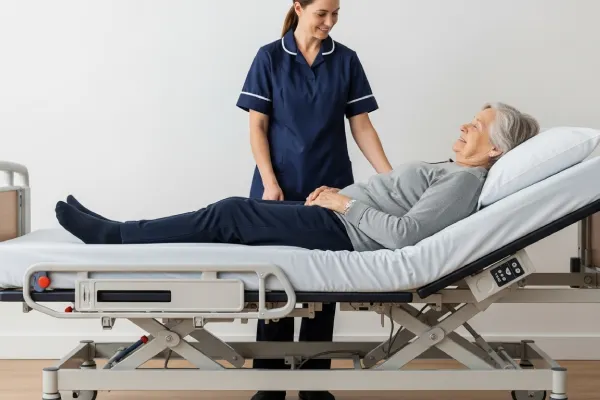 Elderly person on a profiling bed